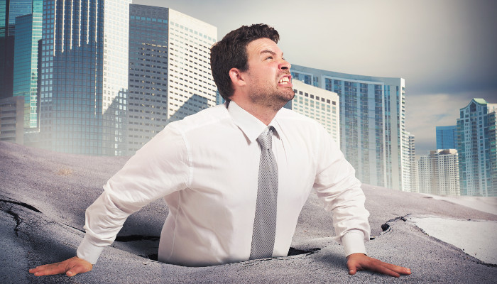 Struggling Man Bogged Down In Quicksand